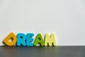 Colorful wooden word Dream with white background1 Royalty Free Stock Photo