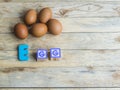 Colorful wooden word Egg on wooden floor1