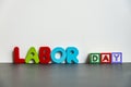 Colorful wooden word Labor day with white background1