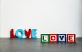 Colorful wooden word Love with white background3 Royalty Free Stock Photo