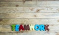 Colorful wooden word Teamwork on wooden floor1