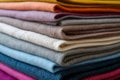 Colorful wool or alpaca blankets stacked in pile. Generative AI Royalty Free Stock Photo