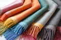 Colorful wool or alpaca blankets stacked in pile. Generative AI Royalty Free Stock Photo