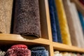 Colorful wool carpets in stores assortment