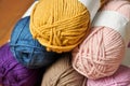 Colorful wool threads for knitting on wooden background Royalty Free Stock Photo
