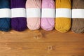 Colorful wool threads for knitting on wooden background Royalty Free Stock Photo