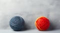 Colorful wool yarn balls on gray background with copy space for text design or advertising concept. Royalty Free Stock Photo