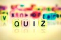 Colorful word cube of QUIZ