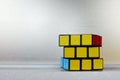 Colorful and world famous Rubik`s cube on a white background.