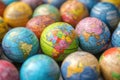 Colorful world globes representing global diversity and internationalism Royalty Free Stock Photo