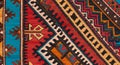 Colorful woven rug detail with strong geometric designs Royalty Free Stock Photo