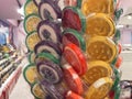 Colorful wrapped lollipops on display, hand made candy, small and big