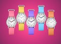 Colorful wrist watches on fuchsia background Royalty Free Stock Photo
