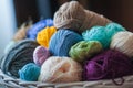 Colorful yarn balls in wicker basket on white Royalty Free Stock Photo