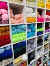 Colorful yarns of wool for knitting in shop