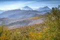 Colorful yellow aspen trees in the fall at a Conway Summit roadside vista point on US 395 in Mono County California, looking at Royalty Free Stock Photo