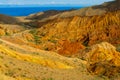 Colorful yellow and different color painted mountain valley and hills Royalty Free Stock Photo