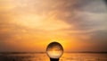 Crystal Lens Ball at Sunrise on the Beach