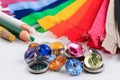 Colorful zippers, pencils and buttons. Royalty Free Stock Photo