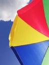 Colorfull ambrella on the blue sky Royalty Free Stock Photo