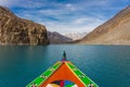 Colorfull boat in Attabad lake in Hunza valley, Karakoram montains range in Pakistan Royalty Free Stock Photo