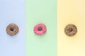 Colorfull Donuts with Icing on Colorfull Background Top View Three Tasty Donuts Horizontal