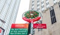 Colorfull Happy Holidays Traffic Sign in Manhattan, New York City. High Rise Skyscrapers in Background Royalty Free Stock Photo