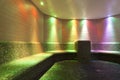 Colorfull illuminated steam bath in public swimmin