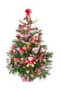 Colorfully decorated isolated Christmas tree with red decoration Royalty Free Stock Photo