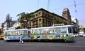 A colorfully decorated tram in the city street of Kolkata. Royalty Free Stock Photo