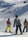 Colorfully dressed snow boarder