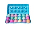 Colorfully dyed carton of 18 Easter eggs. Royalty Free Stock Photo