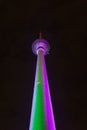 Colorfully Illuminated Berlin Tower at Night