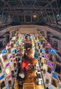 The colorfully lighted Promenade deck at night of the large car ferry MS Silja Symphony