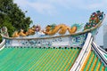 Colorfully Painted Roof Sculptures of Dragons on a Chinese Templ