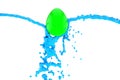 Coloring Easter Egg, Vibrant blue Paint pouring over green egg isolated on white Background. 3d illustration Royalty Free Stock Photo