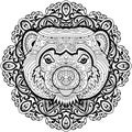 Coloring page for adults. Stern Wolverine on a background of a circular mandala pattern.
