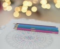 Coloring pencils and mandala book