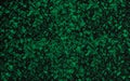 Colorist imagen of green stains over black background