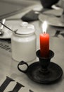 Colorkey, red candle on a table in cafe Royalty Free Stock Photo