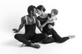 A happy family of ballet dancers on white studio background Royalty Free Stock Photo