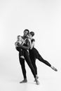 A happy family of ballet dancers on white studio background Royalty Free Stock Photo