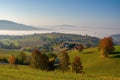 Colors of the autumn rural landscape of the hills in Slovakia, Podpolanie region, Hrinova.