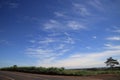 Colors of Brazil, gray, green and a beautiful blue and white in the sky.