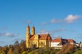 Colors contrast with yellow church and blue sky in Ellwangen Royalty Free Stock Photo