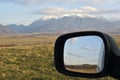 The Colors of countryside as seen from car mirror. Royalty Free Stock Photo