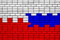 Colors of national flags of Poland and Russia on rough stone wall Royalty Free Stock Photo