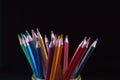 Colors pencil in glass with back background Royalty Free Stock Photo