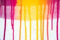 colors of printing ink purple, pink, orange, yellow and magenta colors are dripping Royalty Free Stock Photo