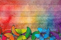 Colors of rainbow. Melody concept. Old music sheet in colorful watercolor paint and multicolored morpho butterflies. Music concept Royalty Free Stock Photo